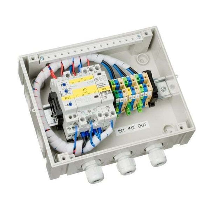 Internal view of Victron 5KVA transfer switch showing contactor, wiring and labelled terminal blocks