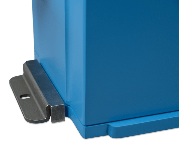 Close-up of a steel mounting bracket inserted into the battery base slot
