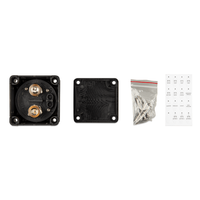 Rear view of battery switch with copper terminals, mounting screws, and labels