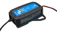Victron Blue Smart Charger installed inside a black protective rubber bumper