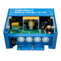 Internal view of battery charger showing AC input terminals and cable entry points