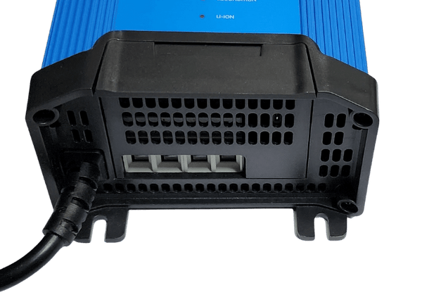 Bottom of charger showing protective terminal cover and AC cable entry