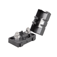 Black Victron MIDI fuse holder with open flip-top cover showing two threaded mounting studs