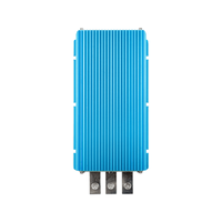 Top-down view of blue finned aluminium DC-DC converter with terminal lugs at the base