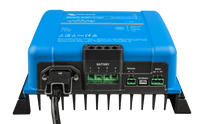 Connection panel of a Victron battery charger showing AC input and DC output terminals