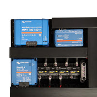 Close-up detail of Victron SmartSolar MPPT, Cerbo GX and Orion XS mounted on black board