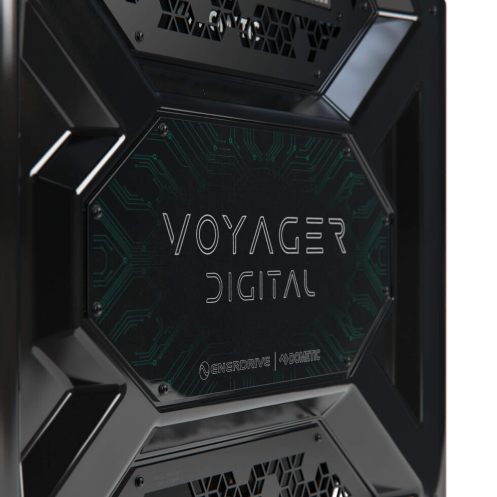 Close-up of the Voyager Digital branding plate on the front enclosure