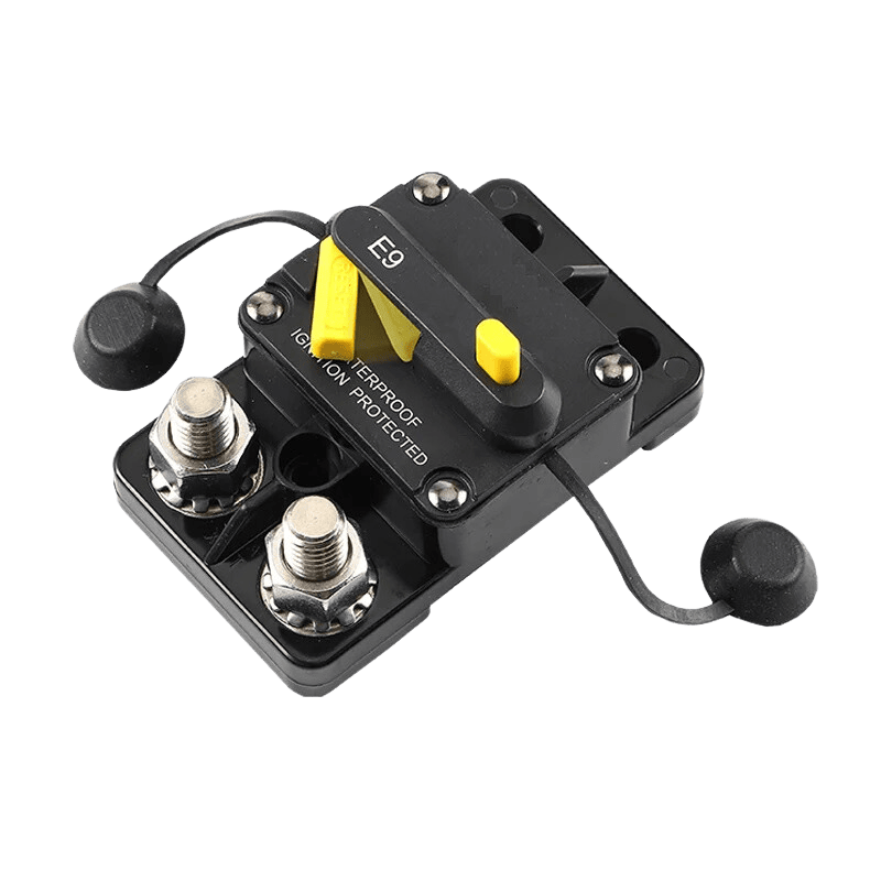 Angled view of 60A circuit breaker showing exposed stainless steel studs and tethered rubber caps