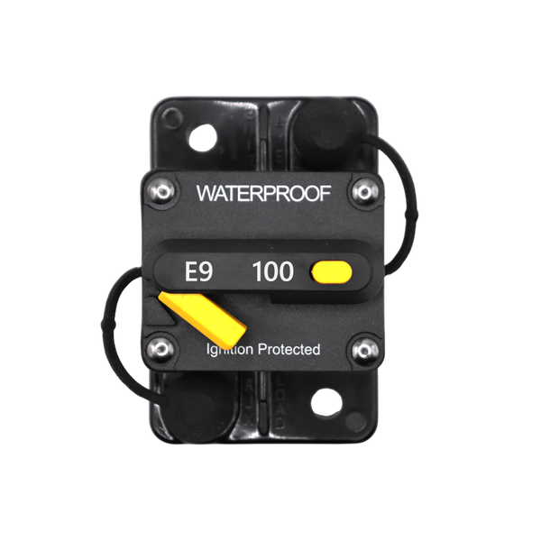 Top-down view of 100A waterproof circuit breaker showing reset lever and trip button