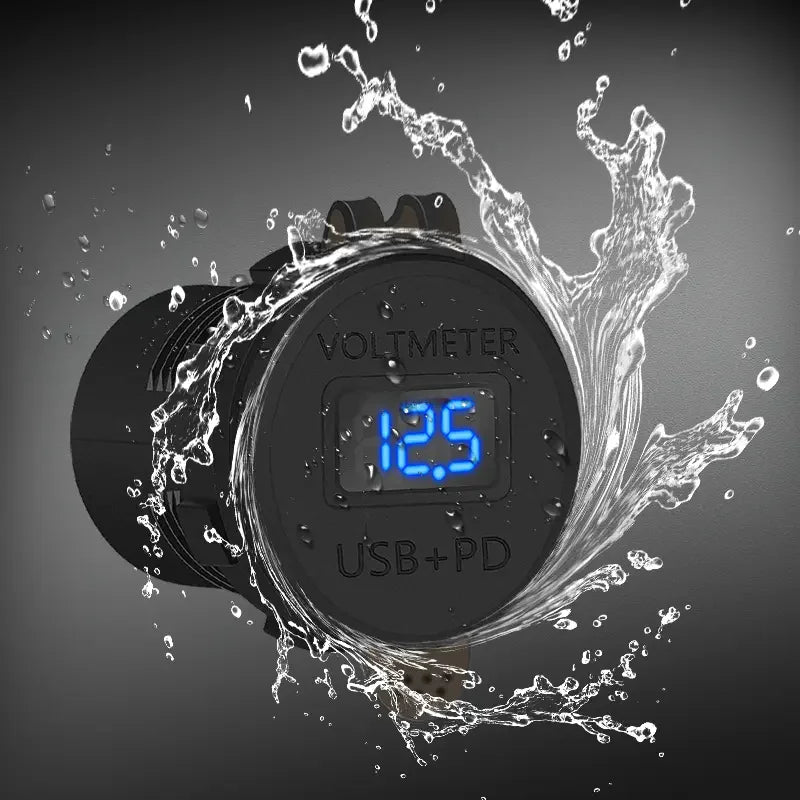 Water splashing around the socket with closed dust cover, showing the blue voltage reading through the clear window