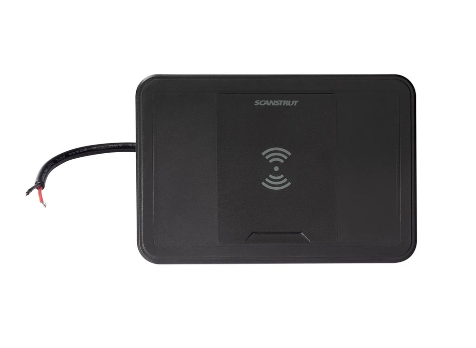 Top-down view of a black wireless charger pad with bare wire pigtail