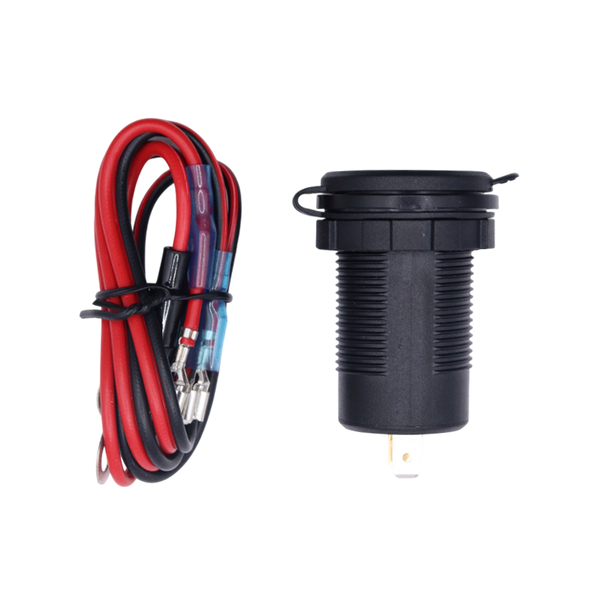 Socket with closed protective cap lying next to the coiled red and black wiring harness