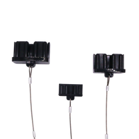 Front and top views of black 175A Anderson plug dust covers