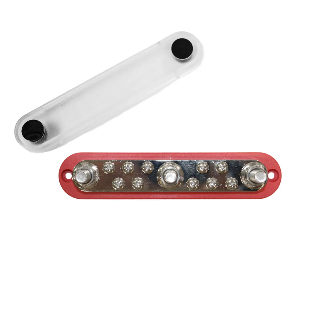 Overhead view of red busbar with three M10 studs, ten screws and detached clear cover