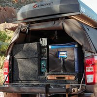 Enerdrive Adventurer power system installed in a vehicle canopy next to a portable fridge