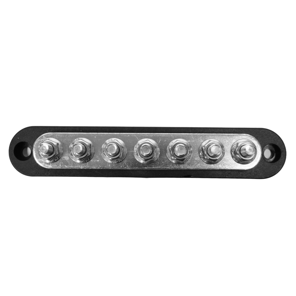 Top-down view of 7-stud busbar showing terminal layout and mounting holes