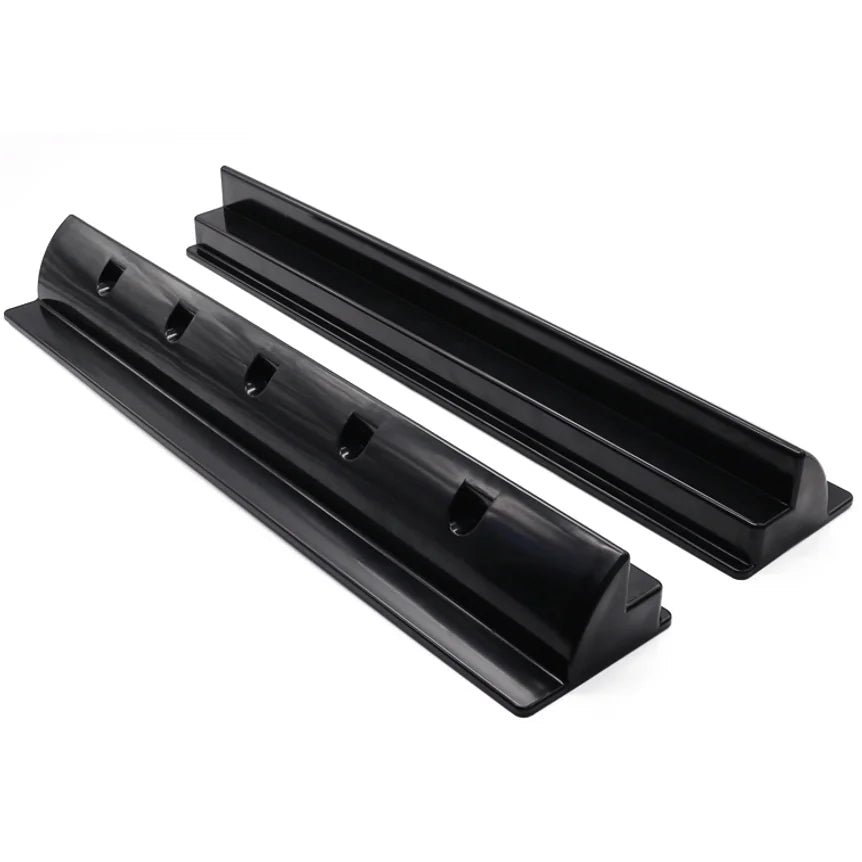 Pair of 680mm black ABS solar panel mounting brackets with aerodynamic profile and recessed screw holes