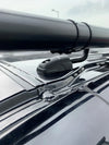Scanstrut cable seal on a black vehicle roof routing protective conduit