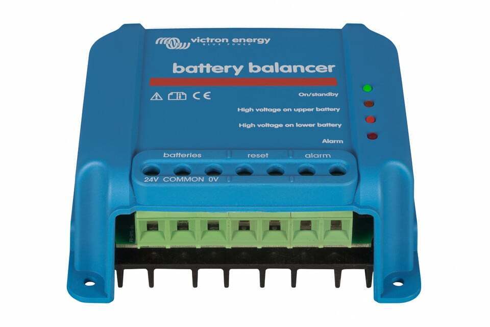Bottom-angled view of battery balancer showing green screw terminals and cooling fins
