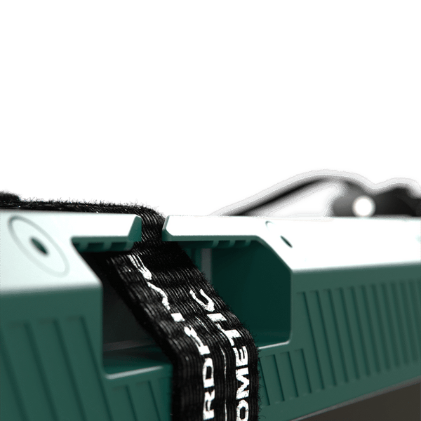 Detail of the integrated mounting strap slot on the battery casing
