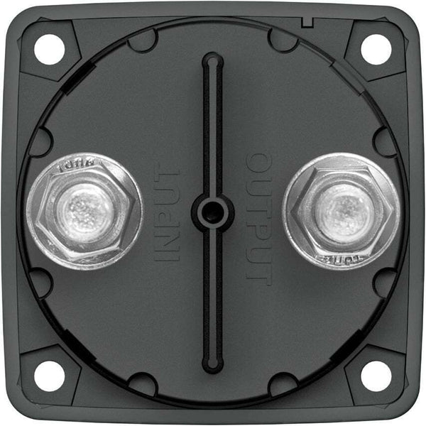 Rear housing of battery switch displaying two terminal studs, retaining nuts and molded input output markings