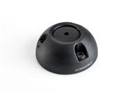 Assembled black Scanstrut cable seal showing the central bung and screw recesses