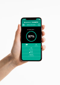 Mobile phone displaying Enerdrive app with battery SOC, voltage and temperature