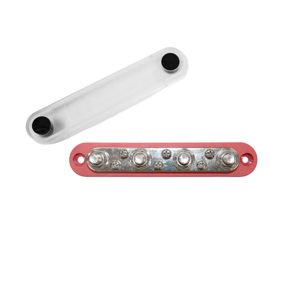 Red busbar with four studs and six screws, shown with its clear protective cover removed