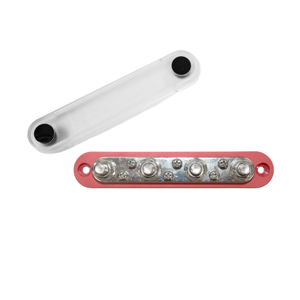 Red busbar with four studs and six screws, shown with its clear protective cover removed