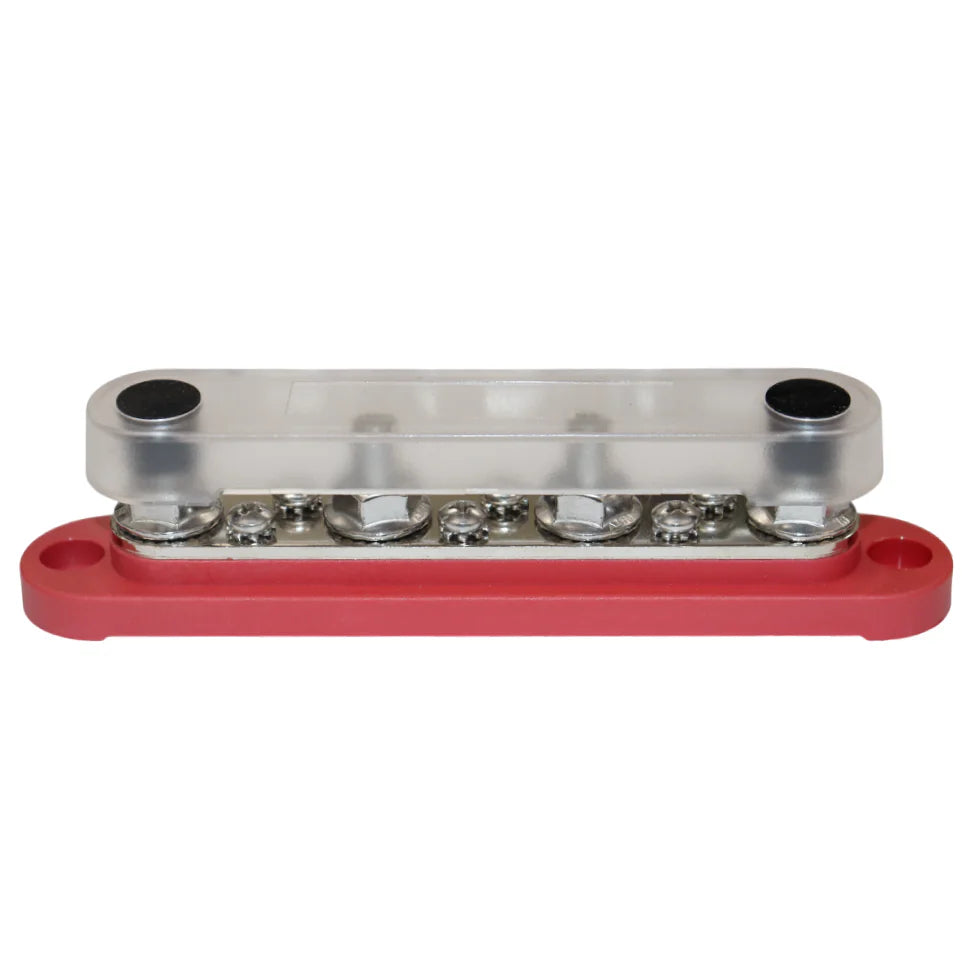 Red busbar with clear protective cover installed over the terminals