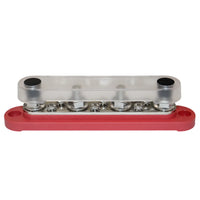 Red busbar with clear protective cover installed over the terminals