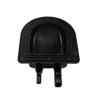 Underside of black plastic housing showing internal cavity and mounting flange
