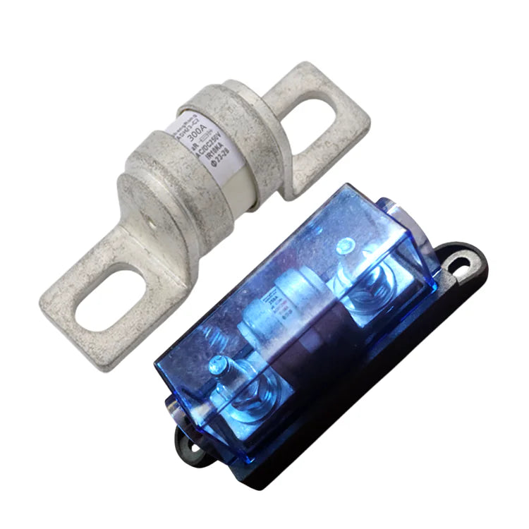 Exotronic 300A ceramic fuse next to a black fuse holder with a blue transparent cover and bolt terminals