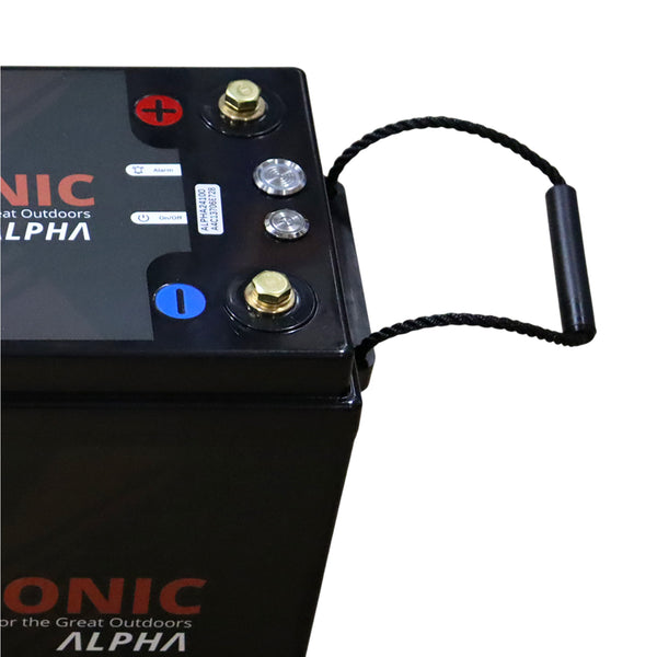 Close-up of battery corner showing M8 terminal bolt, control buttons and rope handle attachment