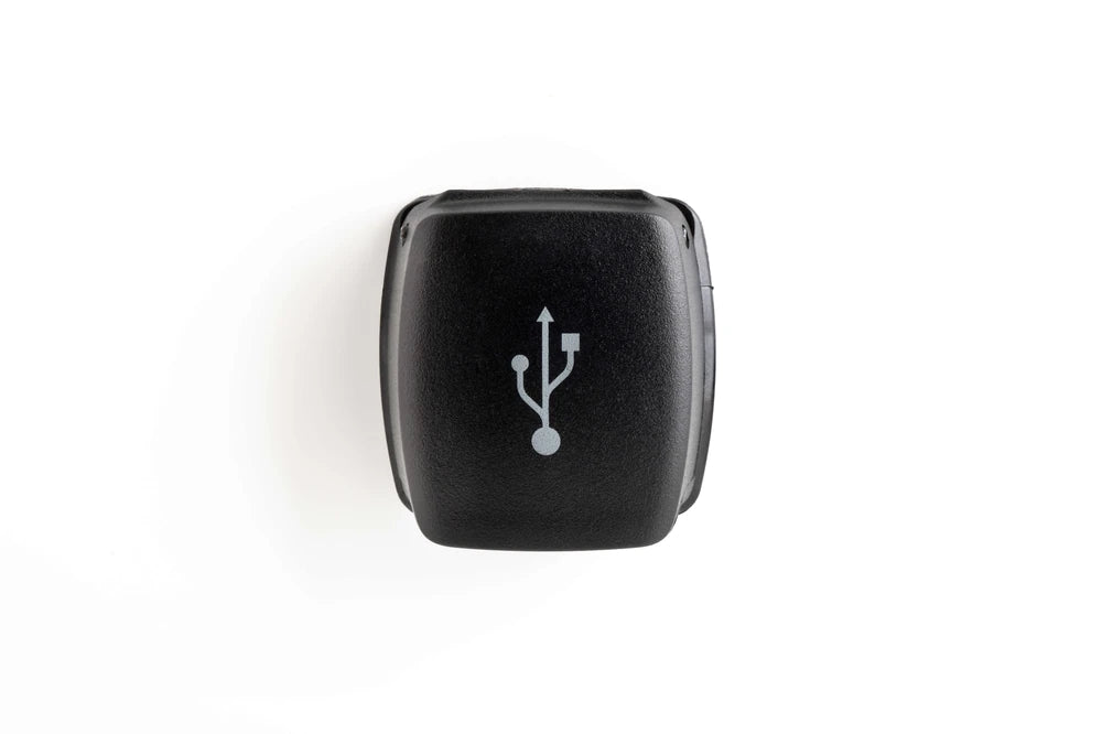 Front view of closed Flip Pro USB socket lid with white icon