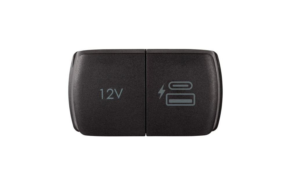 Compact dual power socket unit without bezel showing closed protective lids