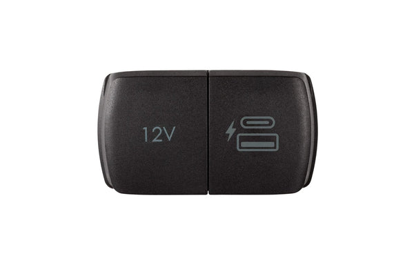 Compact dual power socket unit without bezel showing closed protective lids