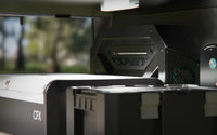 Close-up view of the Enerdrive Voyager light bar installed inside a vehicle storage canopy