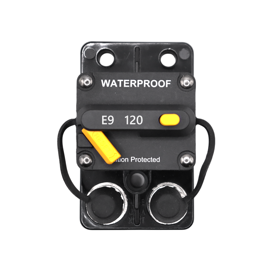 Top view of Exotronic 120A waterproof DC circuit breaker showing yellow reset lever and protective caps