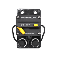 Top view of Exotronic 120A waterproof DC circuit breaker showing yellow reset lever and protective caps