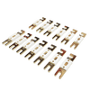 Angled view of multiple Exotronic ANL fuses showing gold terminals and ceramic bodies