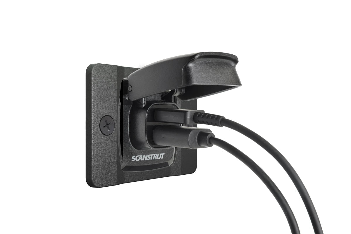 Angle view of Flip Pro dual USB socket with charging cables connected to both ports