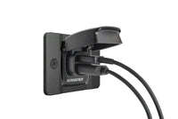 Angle view of Flip Pro dual USB socket with charging cables connected to both ports