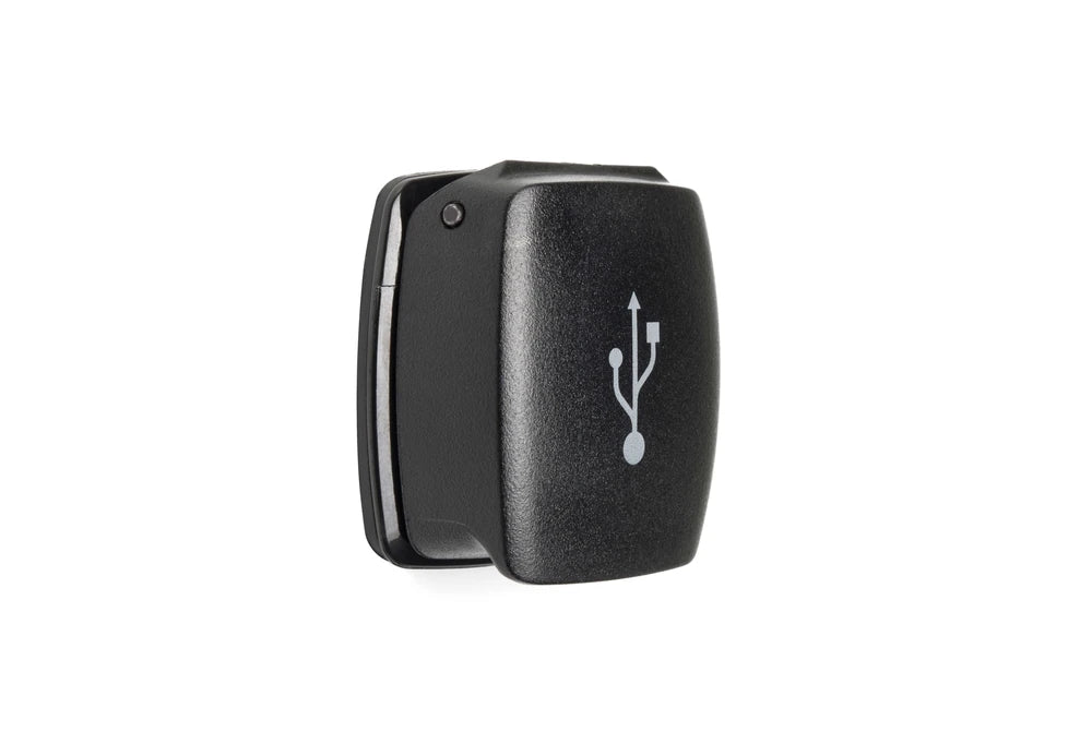 Weatherproof dual USB charger with closed flip lid featuring a white USB icon
