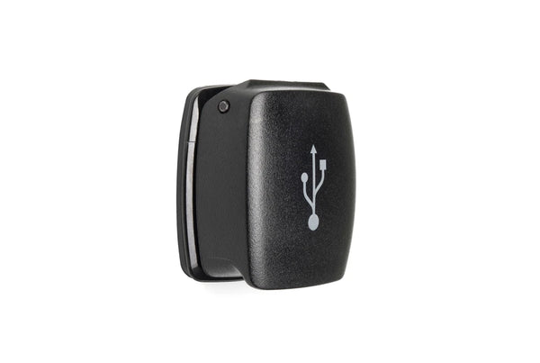 Weatherproof dual USB charger with closed flip lid featuring a white USB icon