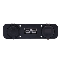 Front view of black flush mount power panel with closed dust covers and central Anderson connector