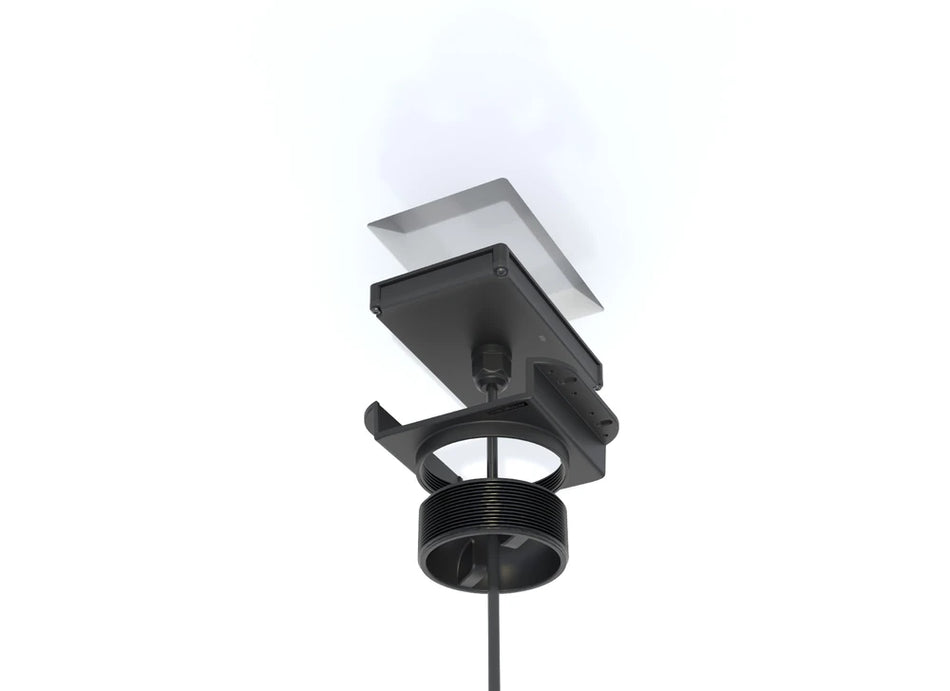 Exploded view showing wireless charger unit, mounting bracket, and compression puck components