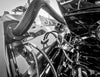Black and white view of the cable seal in a boat engine compartment