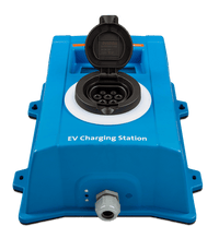Close-up of the open charging socket showing the Type 2 pin configuration for electric vehicles