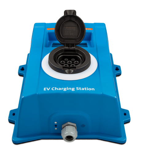 Close-up of the open charging socket showing the Type 2 pin configuration for electric vehicles